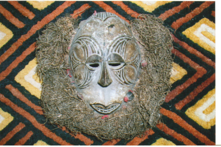Mask-and-raffia-cloth-West-Africa-960x300